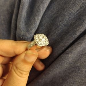 3 carat Diamond ring. I presume it's man made diamonds. Sold as is. Thanks